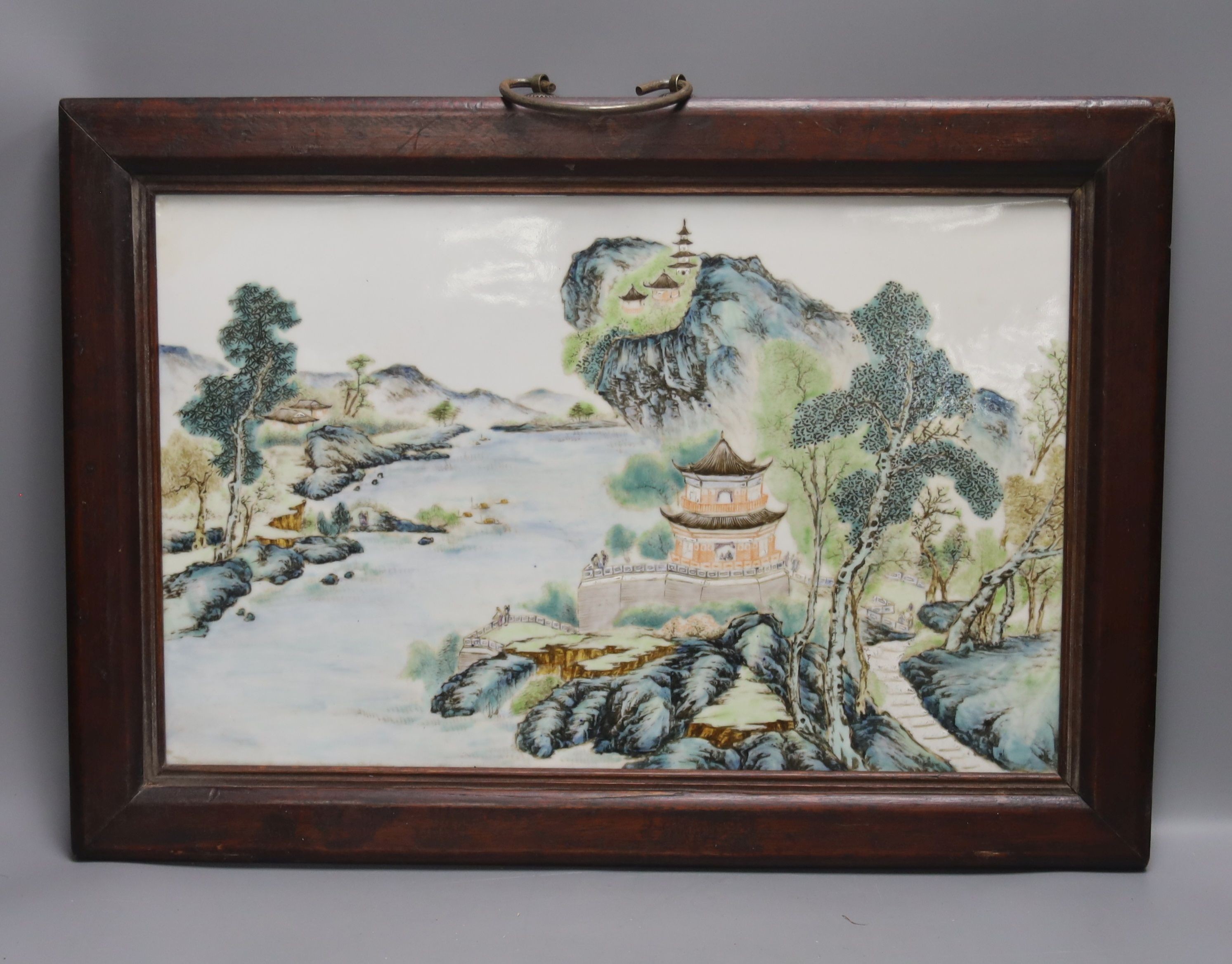 A Chinese enamelled porcelain plaque, in hardwood frame, 27 x 41cm excl. frame